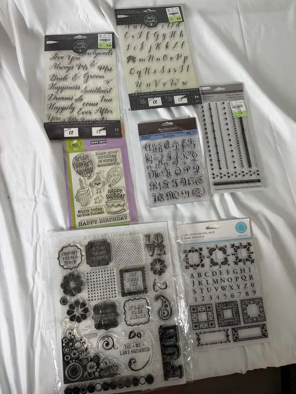 Lot of 7 Clear Acrylic Stamp Sets Various Brands Including Kelly Creates Hero Ar